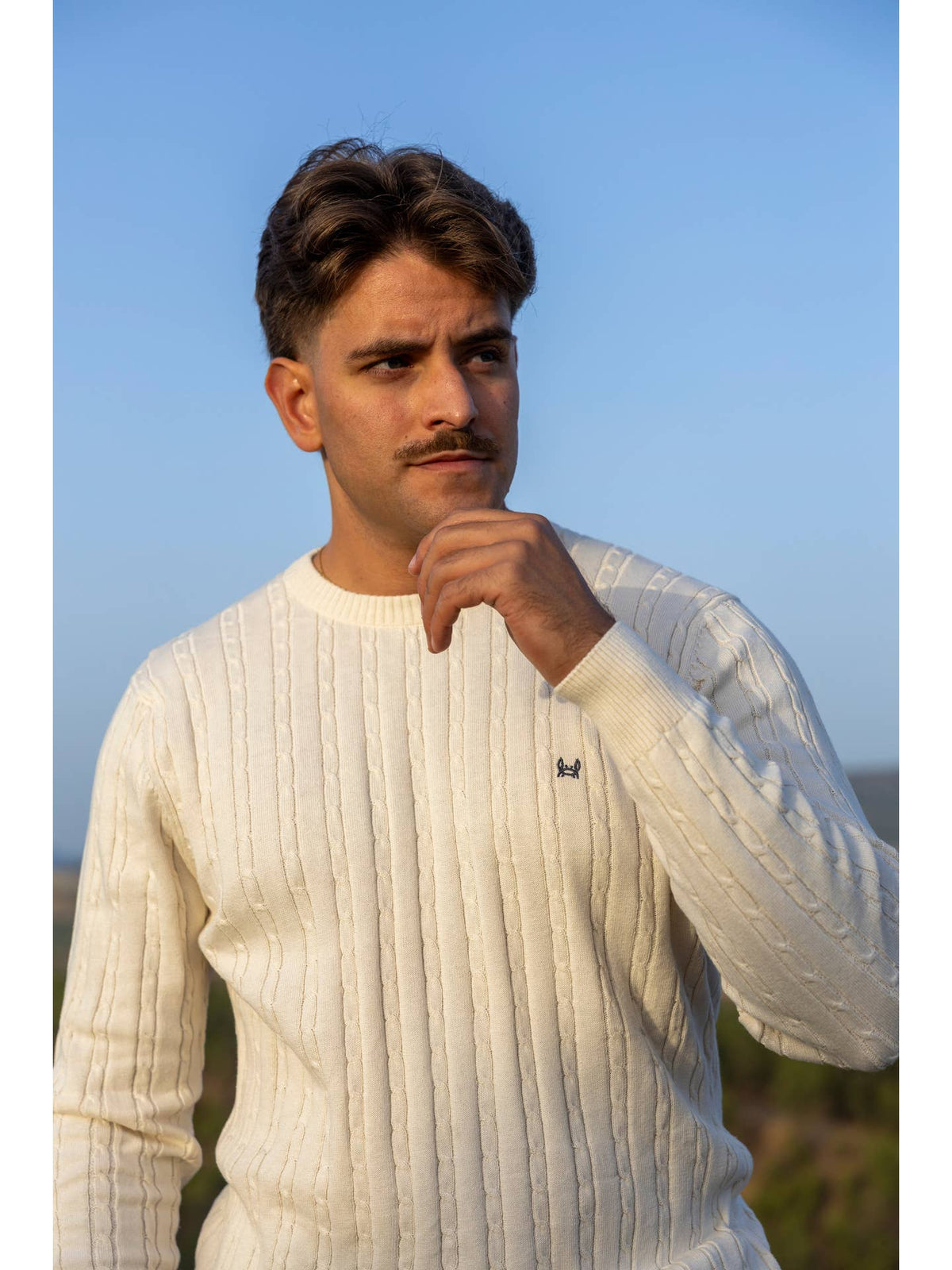 Pull torsadé beige